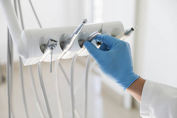 Professional Tooth Extraction technician working in Somerville, TX